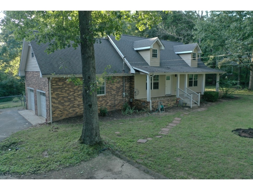 6824 Beckwith Road Mount Juliet, TN 37122 - Photo 26 of 36 a front view of a house with garden