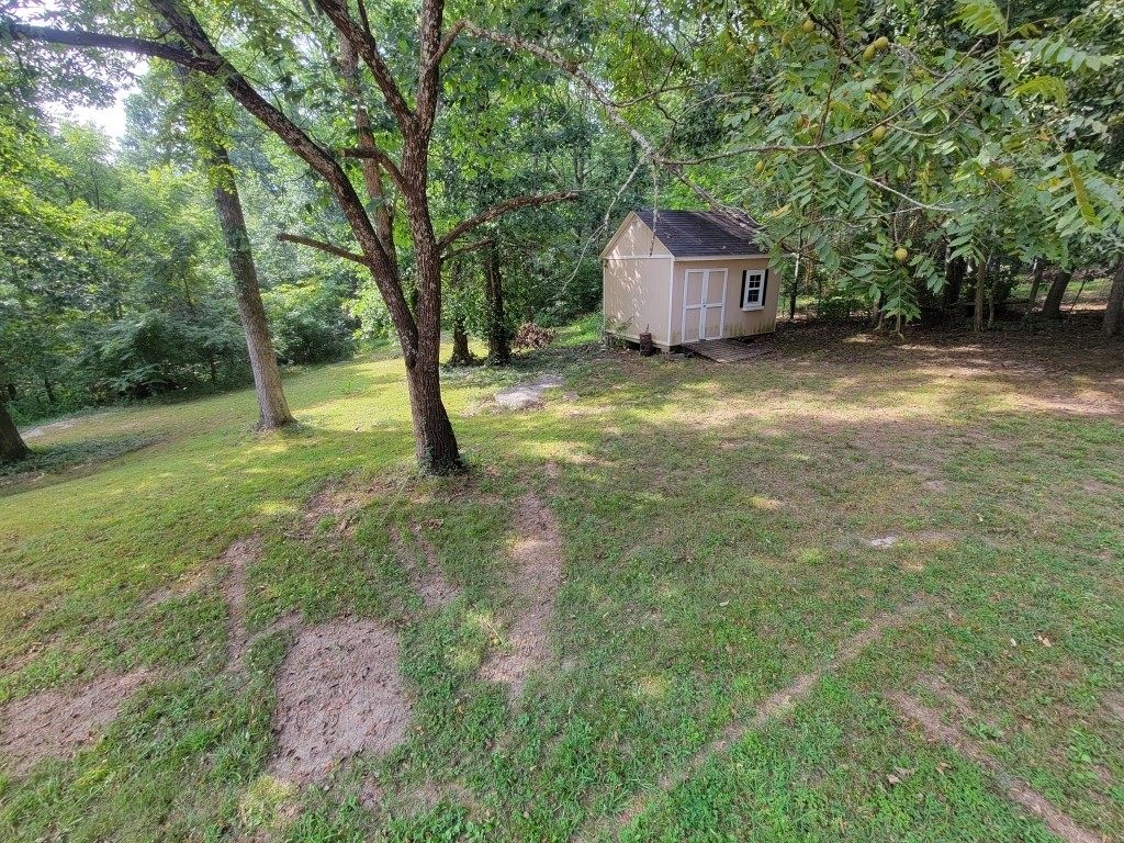 6824 Beckwith Road Mount Juliet, TN 37122 - Photo 32 of 36 a house view with a trees
