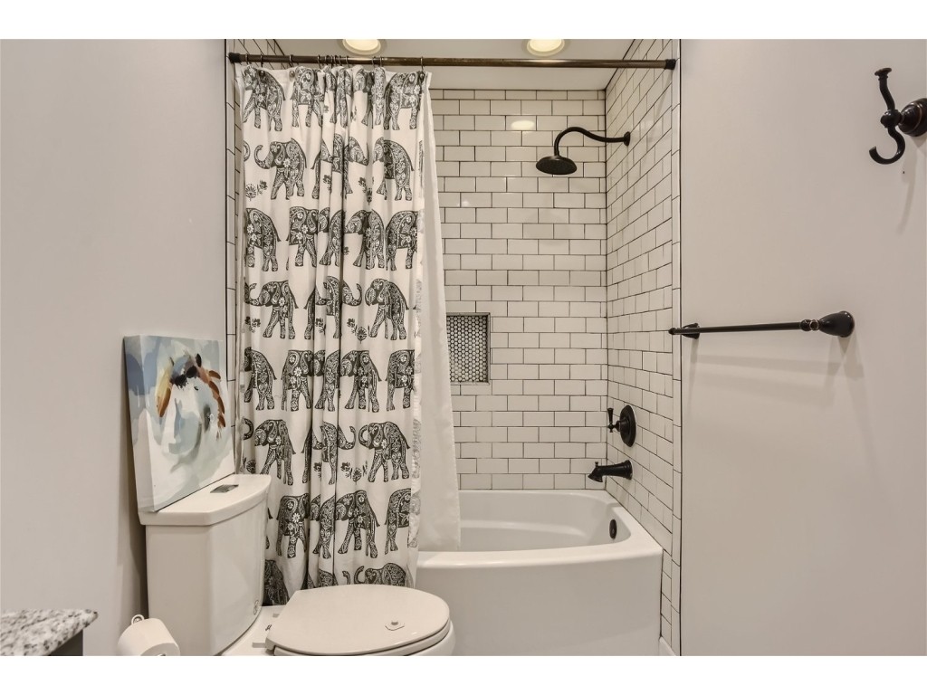 6824 Beckwith Road Mount Juliet, TN 37122 - Photo 10 of 36 a bathroom with a toilet and a shower