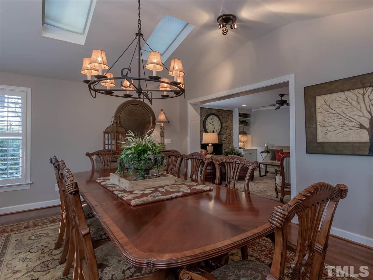 1003 Queensferry Road Cary, NC 27511 - Photo 13 of 30 Spacious sun room is currently used for dining. So many uses for this space!