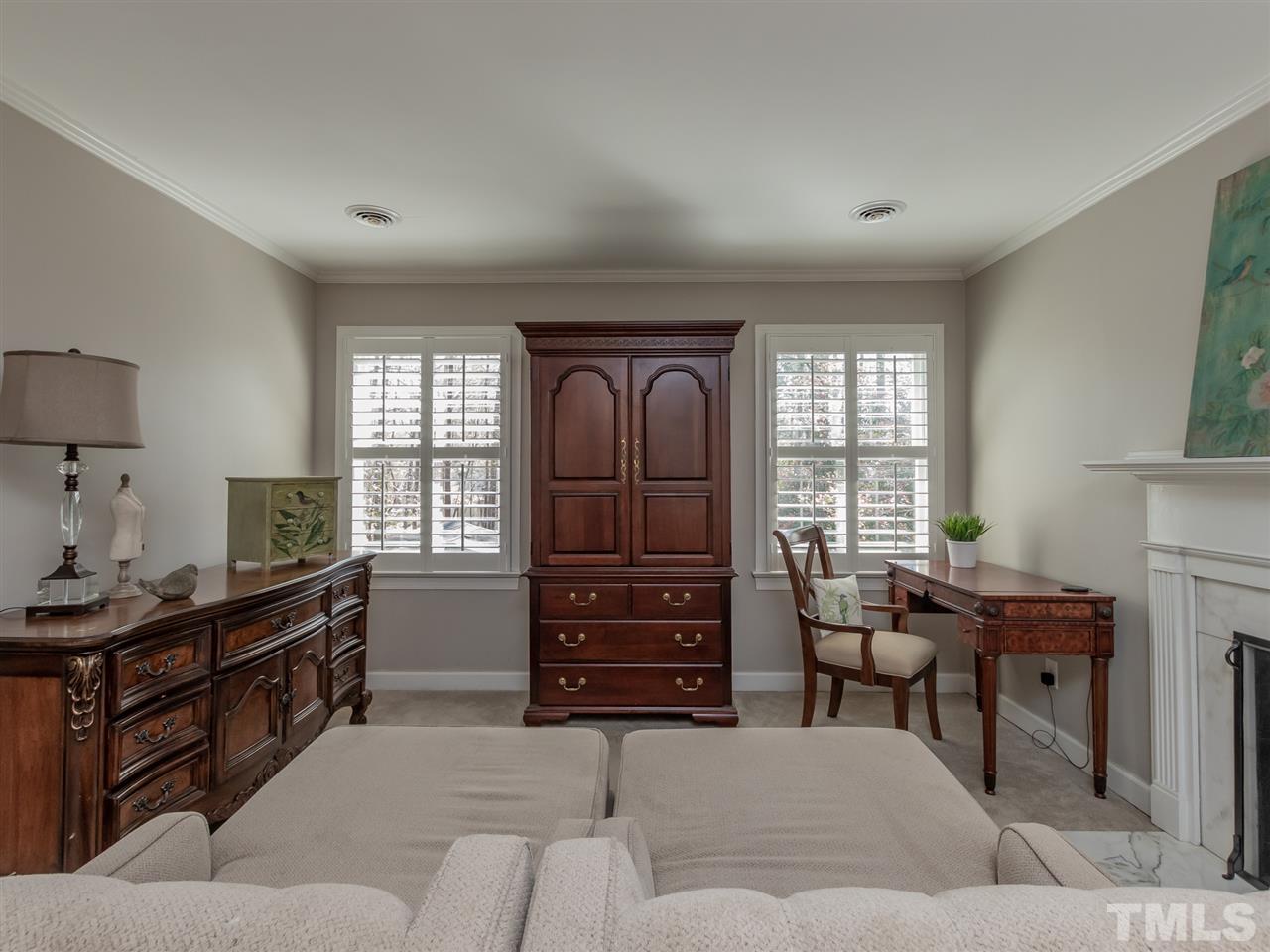 1003 Queensferry Road Cary, NC 27511 - Photo 20 of 30 Sitting area with fireplace. The master is huge!