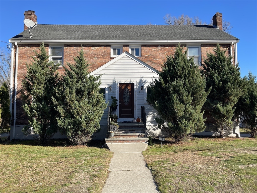 76 Cloverdale Road, Unit 76 Newton, MA 02461 - Photo 10 of 10 a view of a house with a yard