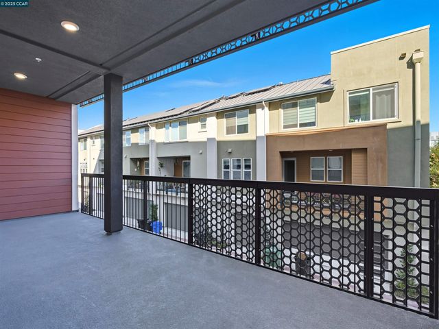 a front view of a house with a large window