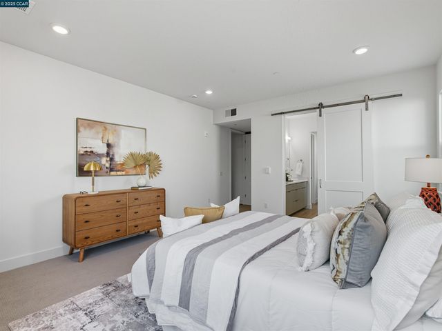 a bedroom with a bed and closet