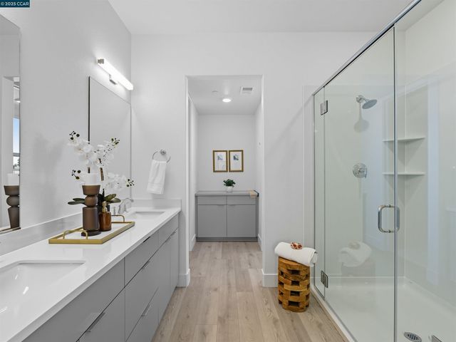 a kitchen with a refrigerator and a sink
