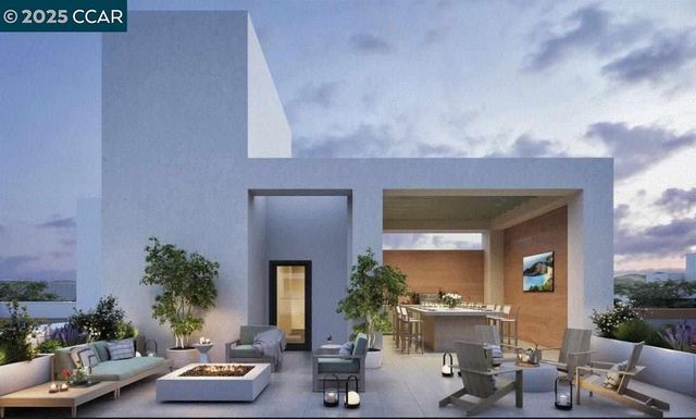 a front view of a house with outdoor seating