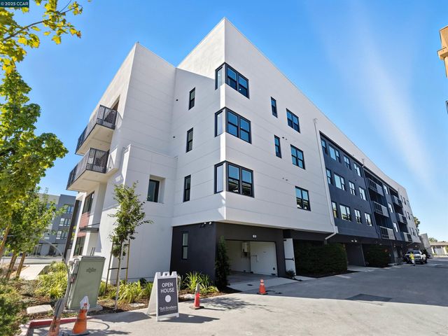 a view of a building with a street