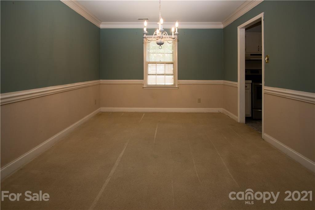 412 Neill Ridge Road Matthews, NC 28105 - Photo 11 of 25 a view of an empty room with a window