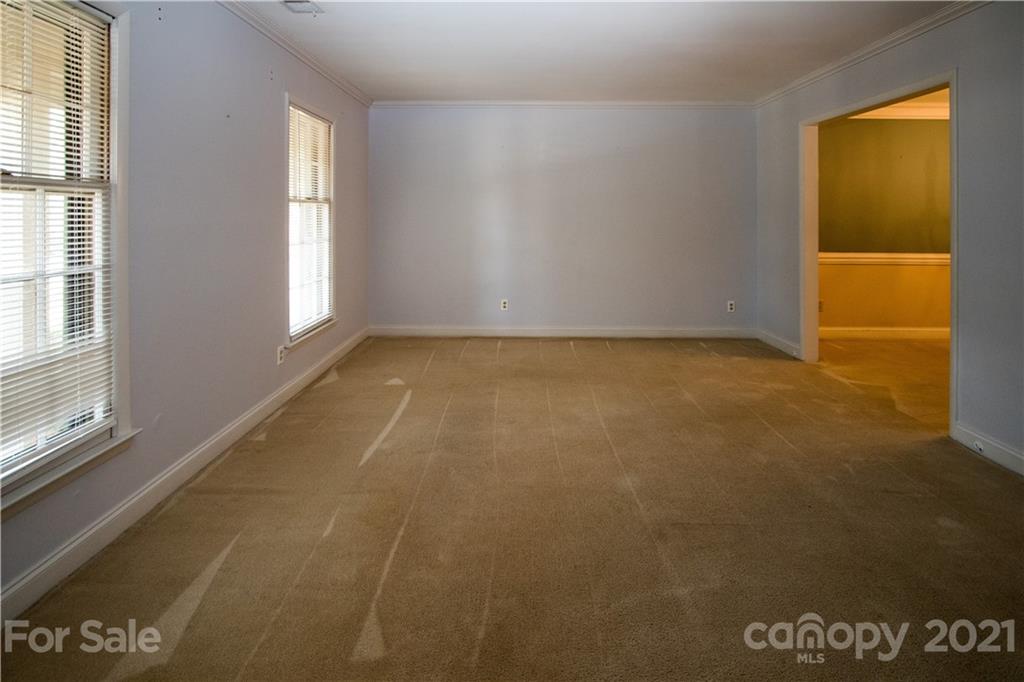 412 Neill Ridge Road Matthews, NC 28105 - Photo 12 of 25 a view of an empty room with a window