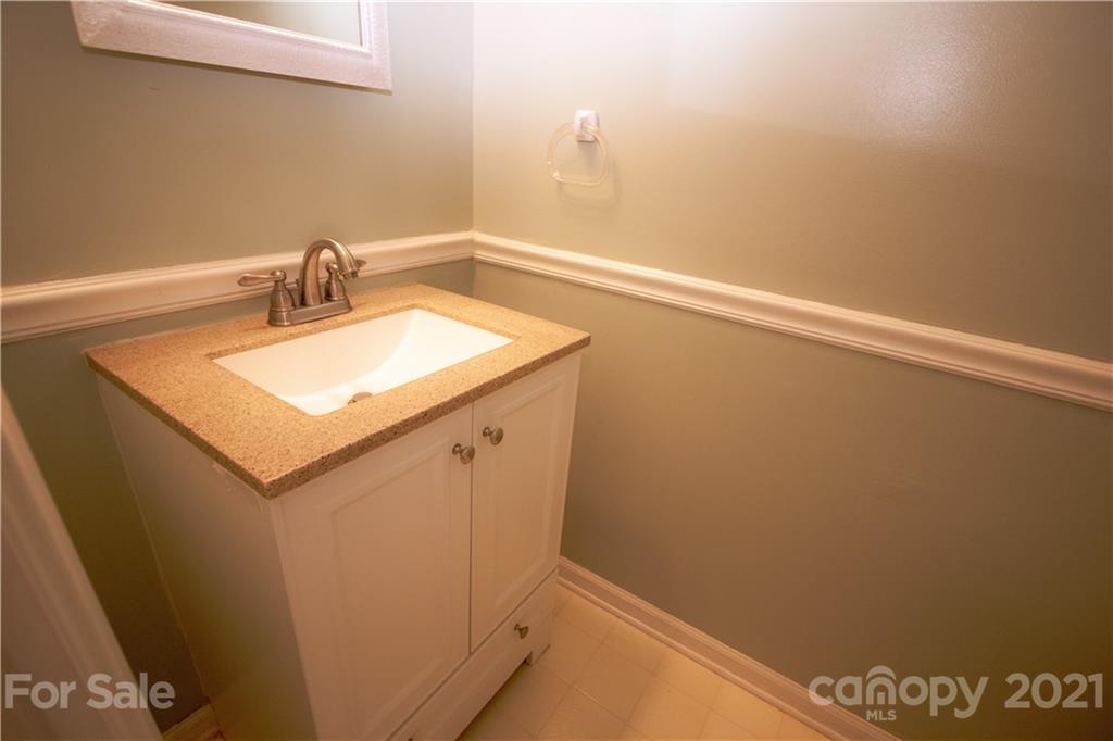 412 Neill Ridge Road Matthews, NC 28105 - Photo 15 of 25 a bathroom with a sink and vanity
