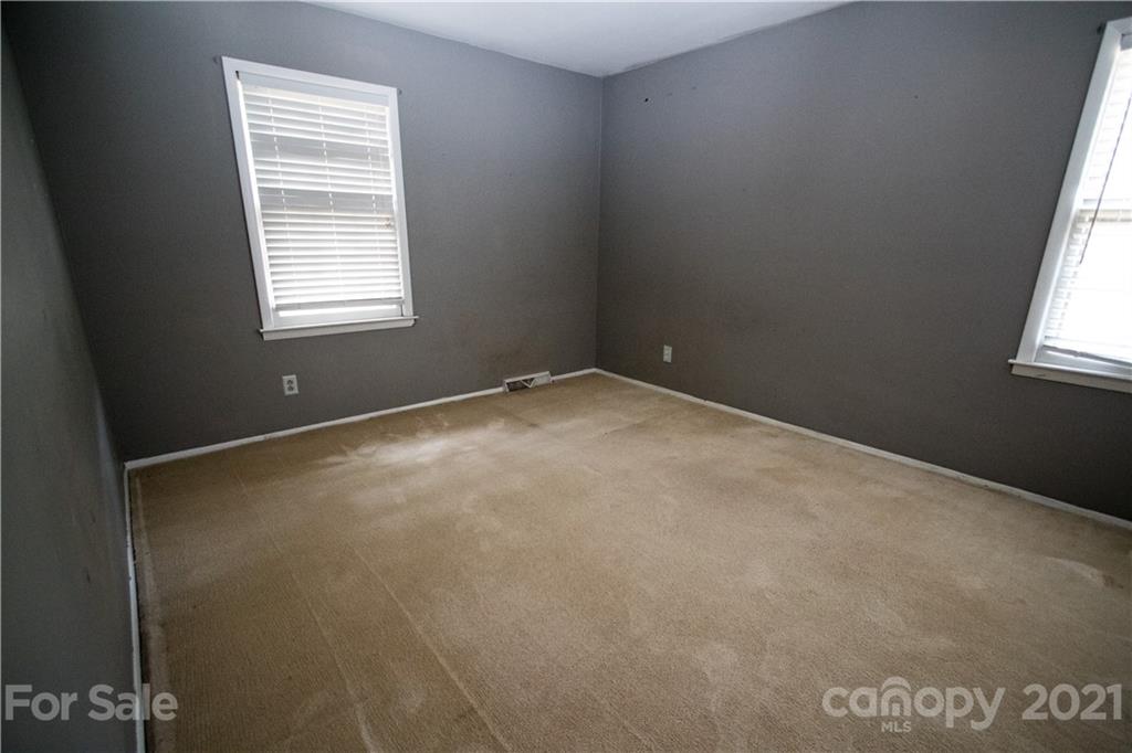 412 Neill Ridge Road Matthews, NC 28105 - Photo 16 of 25 an empty room with windows