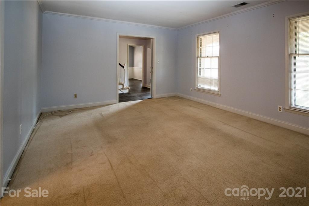 412 Neill Ridge Road Matthews, NC 28105 - Photo 9 of 25 an empty room with windows