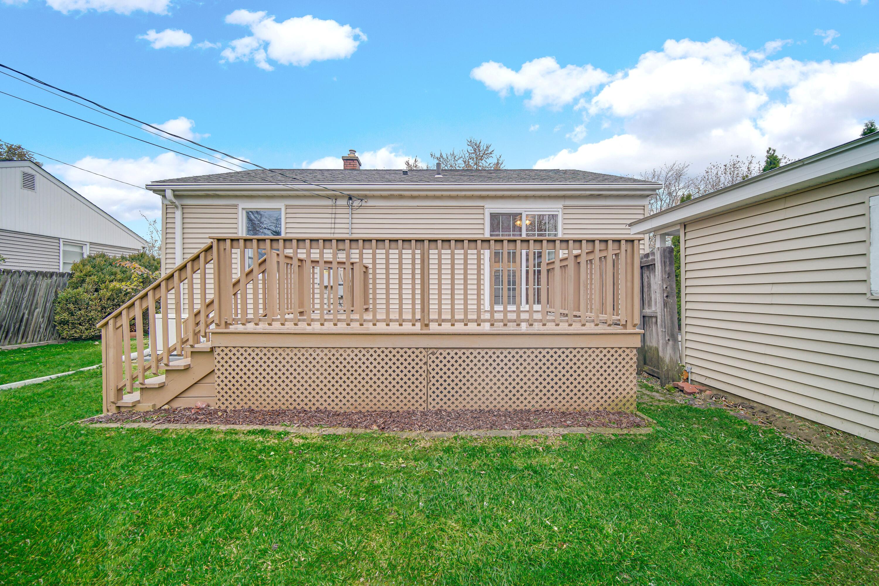 3302 Eder Street Highland, IN 46322 - Photo 16 of 19 a view of a house with backyard and sitting area