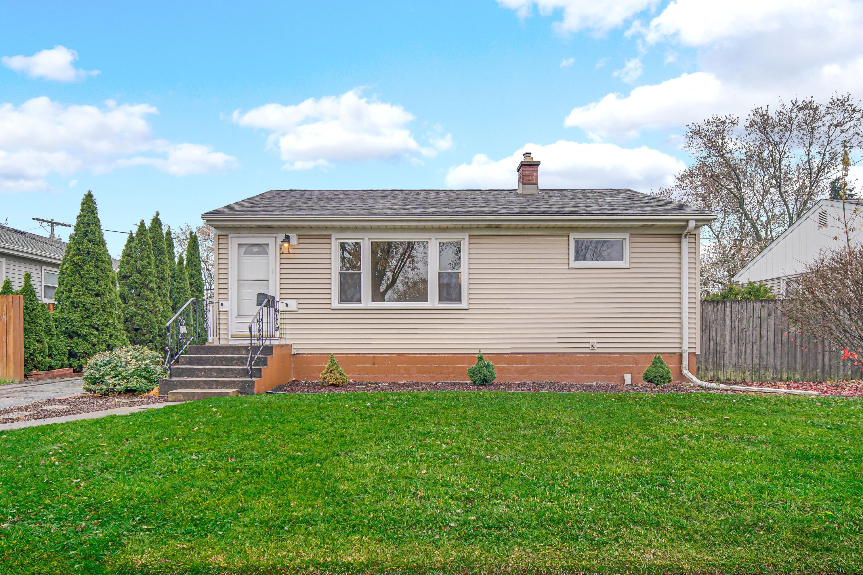 3302 Eder Street Highland, IN 46322 - Photo 19 of 19 a front view of a house with a yard and green space