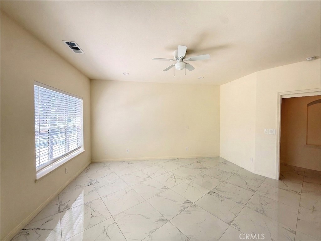 39850 Kapalua Way Temecula, CA 92592 - Photo 15 of 35 a view of an empty room with a window