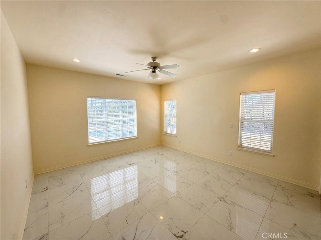 39850 Kapalua Way Temecula, CA 92592 - Photo 17 of 35 a view of an empty room with a window