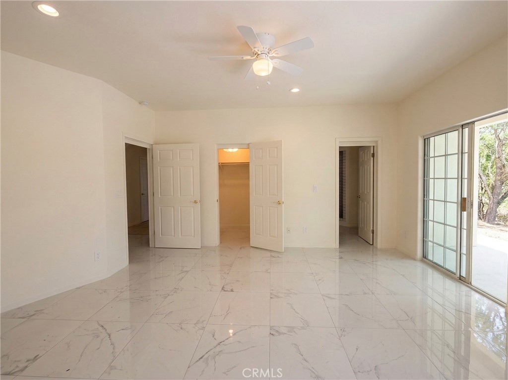 39850 Kapalua Way Temecula, CA 92592 - Photo 19 of 35 a view of an empty room with a window