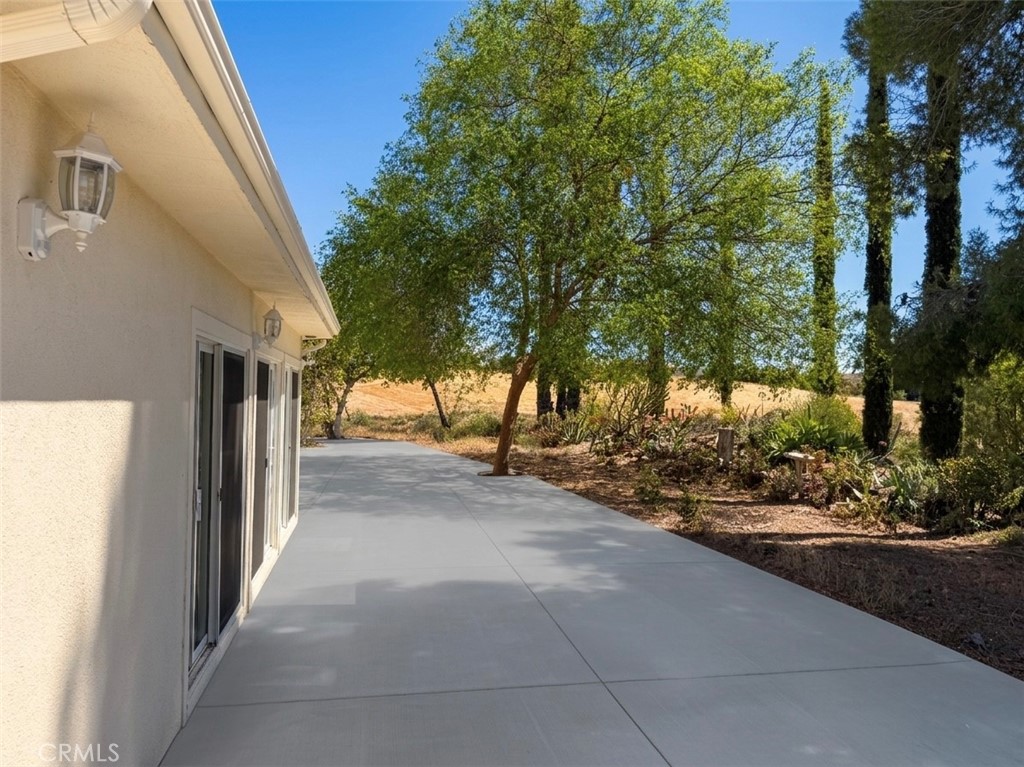 39850 Kapalua Way Temecula, CA 92592 - Photo 21 of 35 a view of a house with a yard and pathway