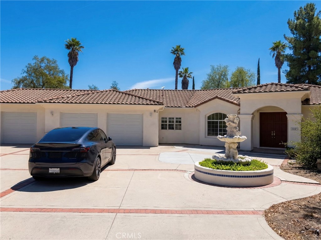 39850 Kapalua Way Temecula, CA 92592 - Photo 3 of 35 a house view with a garden space