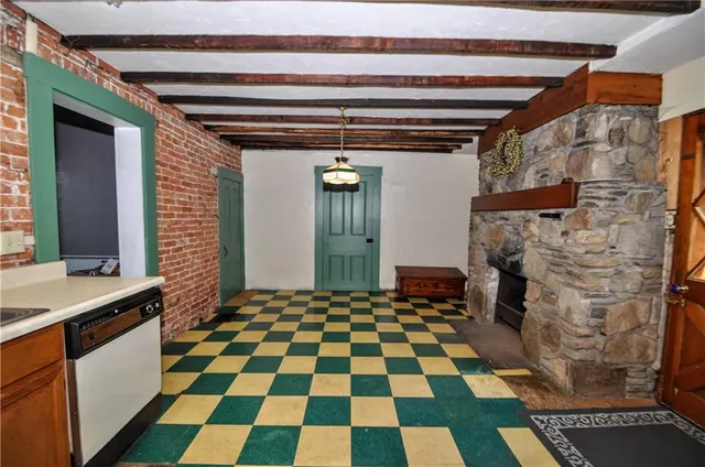 a view of an entryway with wooden floor and stairs