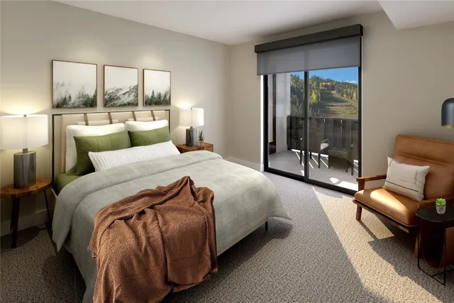 a bedroom with a bed and a lamp next to a window