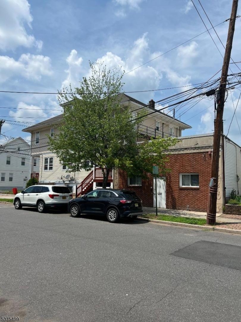 48 1st Avenue Raritan, NJ 08869 - Photo 3 of 10 a view of a cars parked in front of a building