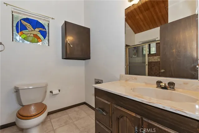 a view of an empty room with a fireplace