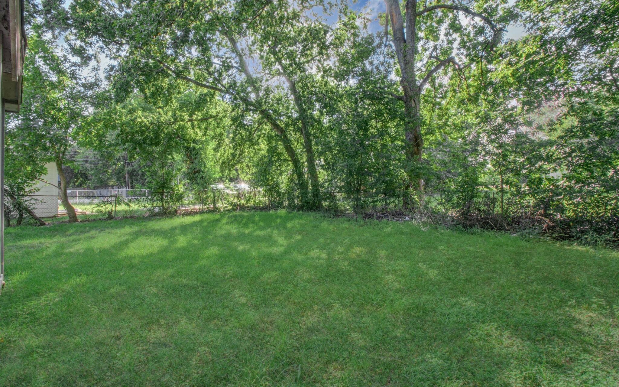 6830 New York Street Houston, TX 77021 - Photo 27 of 28 a view of outdoor space with deck and yard