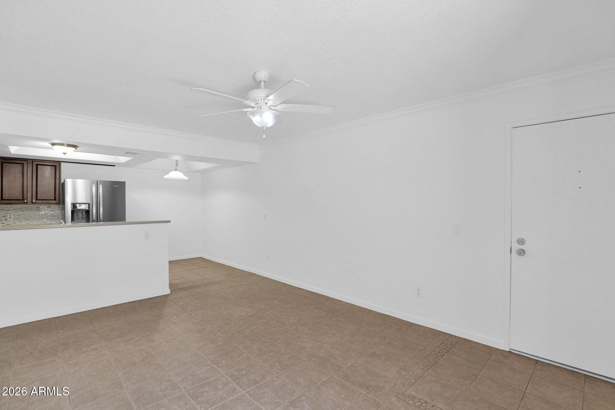 1720 East Thunderbird Road, Unit 1019 Phoenix, AZ 85022 - Photo 10 of 47 an empty room with chandelier fan