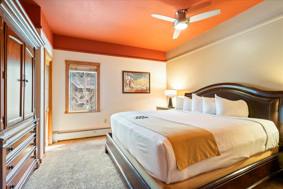 91 River Run Road, Unit 8111 Keystone, CO 80435 - Photo 20 of 43 a bedroom with a bed and a window