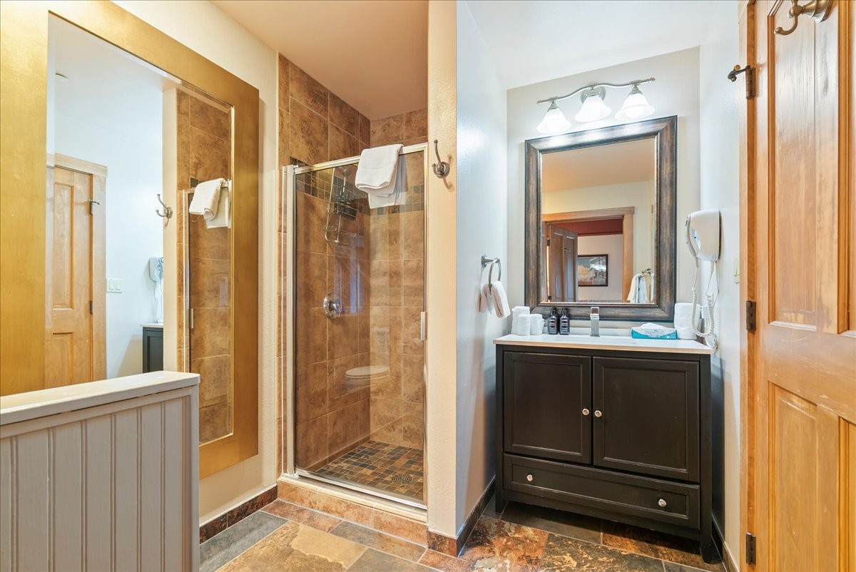 91 River Run Road, Unit 8111 Keystone, CO 80435 - Photo 23 of 43 a view of walk in closet and bathroom