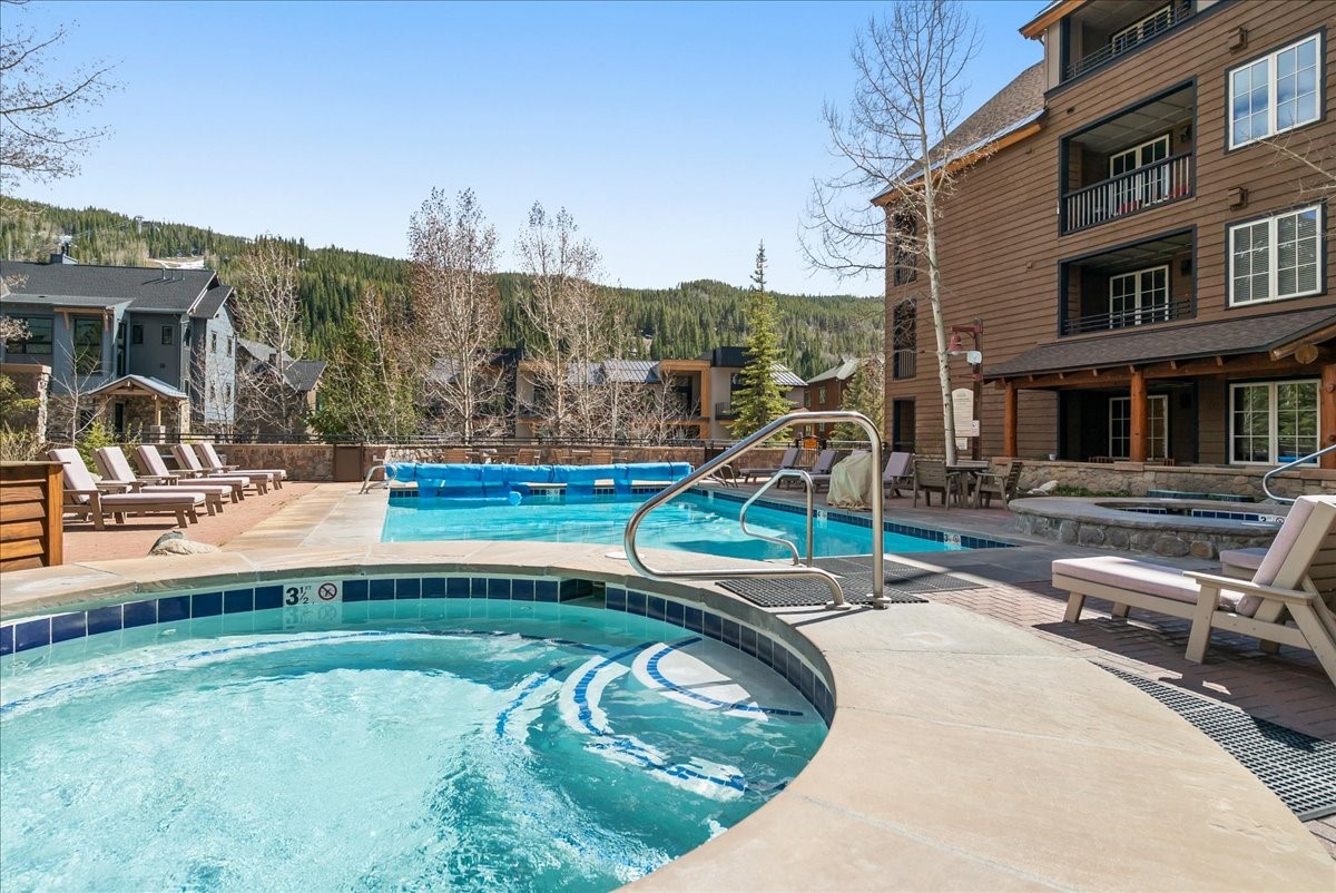 91 River Run Road, Unit 8111 Keystone, CO 80435 - Photo 31 of 43 a view of a house with a park