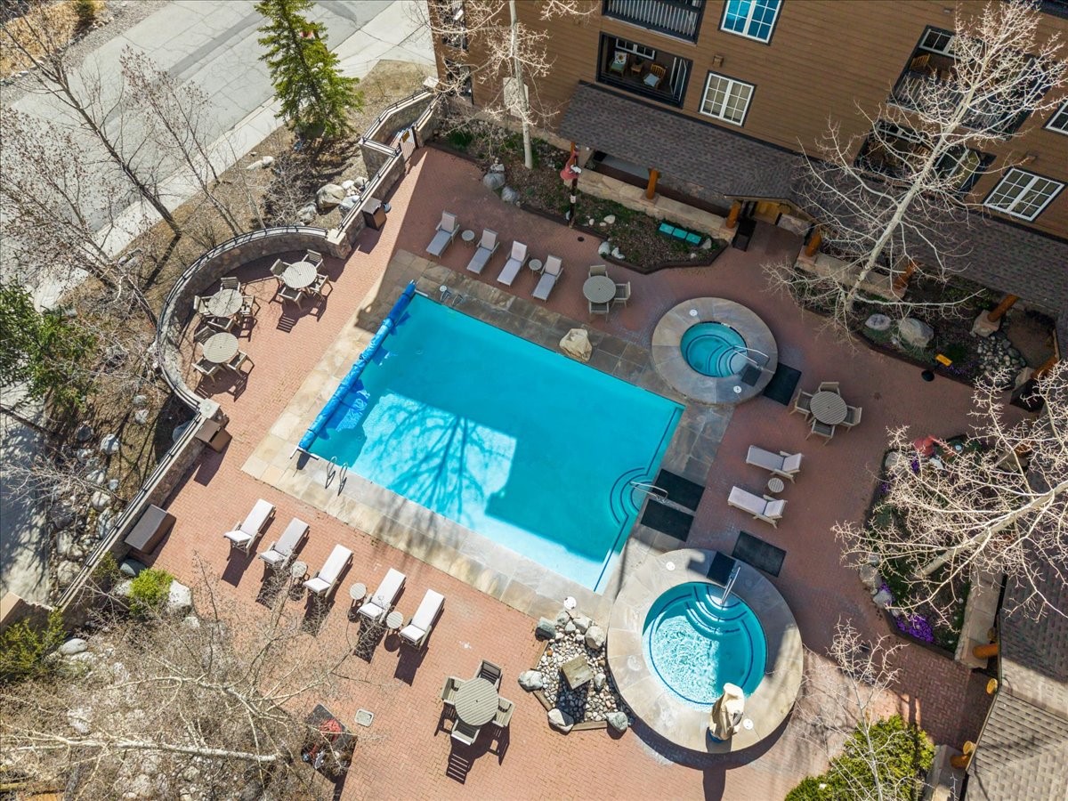 91 River Run Road, Unit 8111 Keystone, CO 80435 - Photo 34 of 43 an aerial view of a house patio swimming pool and outdoor seating