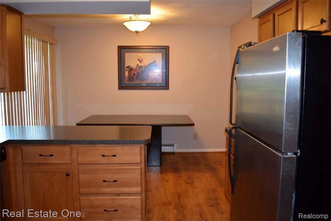 3838 East Allen Road Howell, MI 48855 - Photo 5 of 29 Other view of kitchen with dining area.