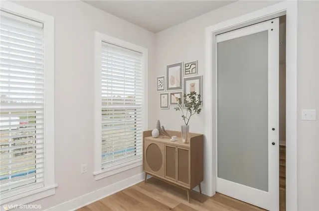 a bathroom with a sink and a window