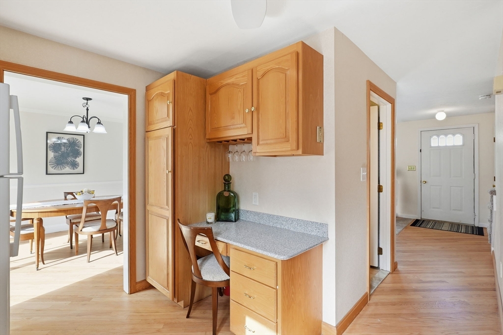 1032 Main Street, Unit 6 Millis, MA 02054 - Photo 14 of 42 a view of kitchen with furniture and wooden floor