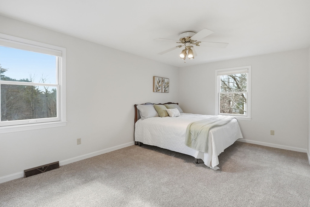 1032 Main Street, Unit 6 Millis, MA 02054 - Photo 16 of 42 a bedroom with a bed and a window
