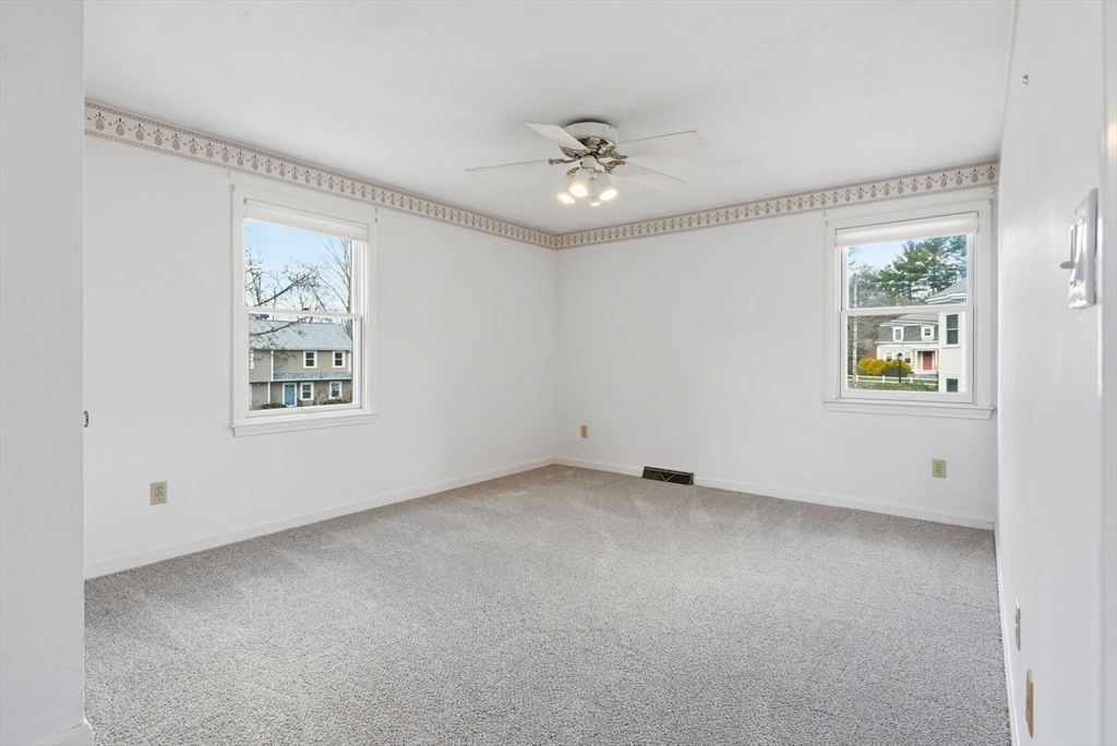 1032 Main Street, Unit 6 Millis, MA 02054 - Photo 21 of 42 a view of an empty room with a window