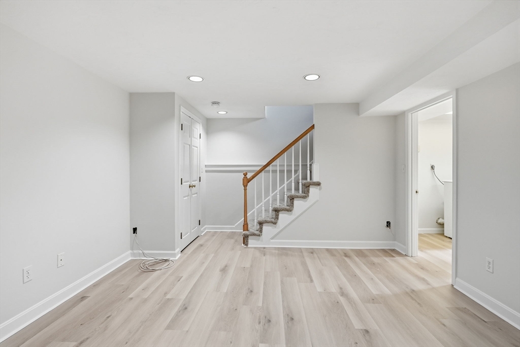 1032 Main Street, Unit 6 Millis, MA 02054 - Photo 26 of 42 a view of entryway with wooden floor