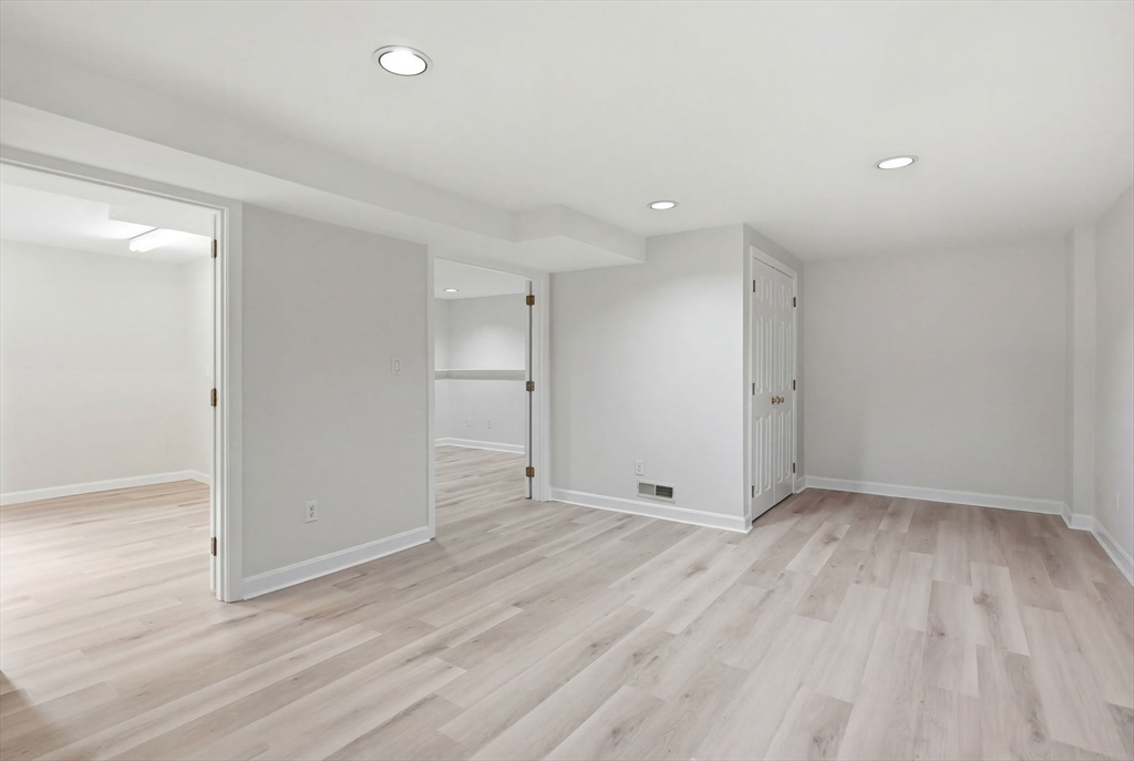 1032 Main Street, Unit 6 Millis, MA 02054 - Photo 27 of 42 wooden floor in an empty room with wooden floor