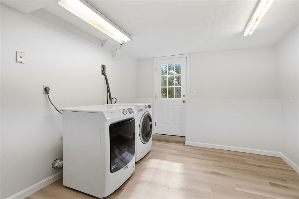 1032 Main Street, Unit 6 Millis, MA 02054 - Photo 31 of 42 a utility room with dryer and washer
