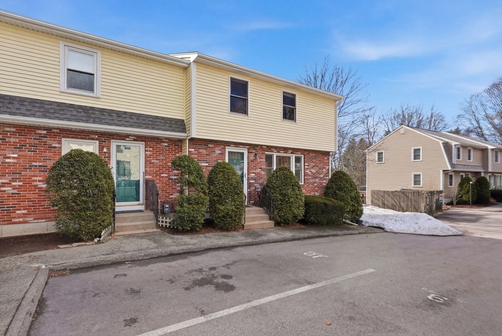 1032 Main Street, Unit 6 Millis, MA 02054 - Photo 36 of 42 a view of a house with a yard