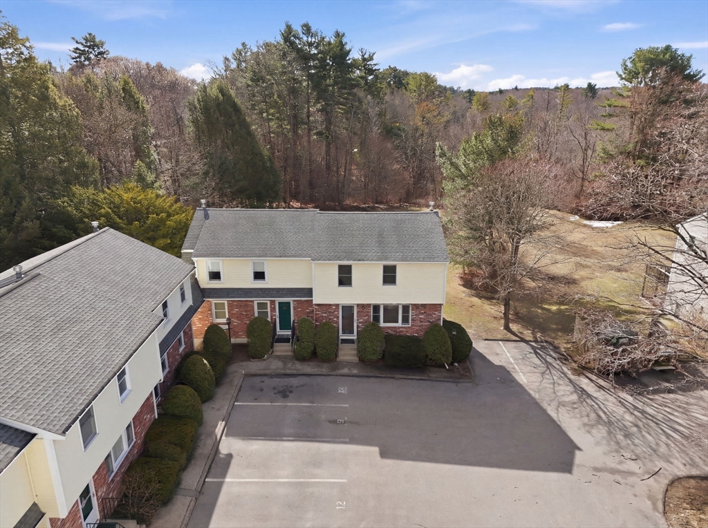 1032 Main Street, Unit 6 Millis, MA 02054 - Photo 37 of 42 a view of a house with a yard