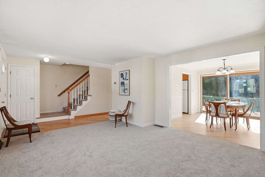 1032 Main Street, Unit 6 Millis, MA 02054 - Photo 6 of 42 a view of a livingroom with furniture and a window