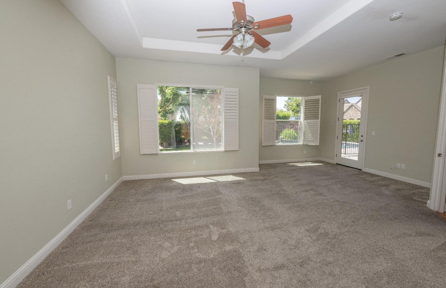1778 Osmun Avenue Clovis, CA 93619 - Photo 23 of 35 an empty room with windows and fan