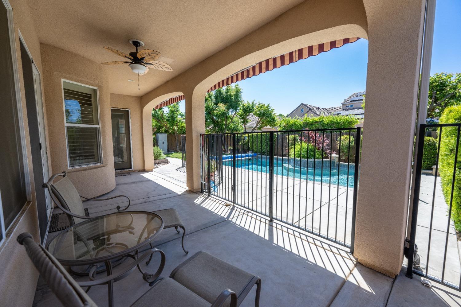 1778 Osmun Avenue Clovis, CA 93619 - Photo 27 of 35 a view of a porch with furniture and backyard