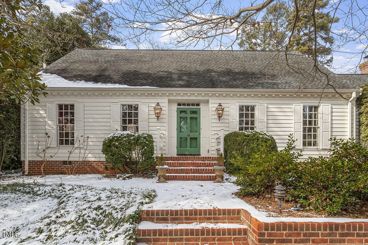 3305 Landor Road Raleigh, NC 27609 - Photo 1 of 39 a view of a house with a yard