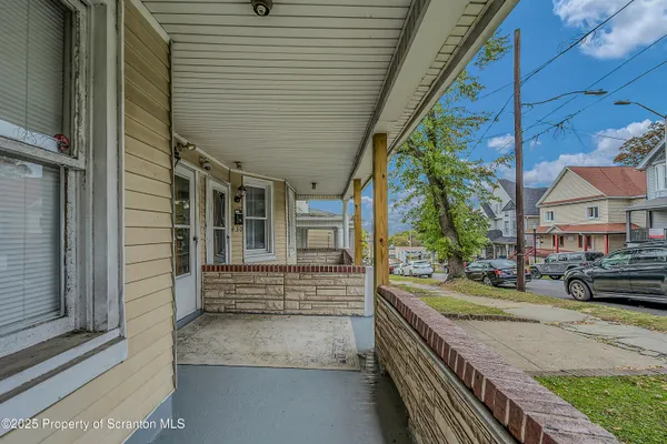 a view of a house with a street