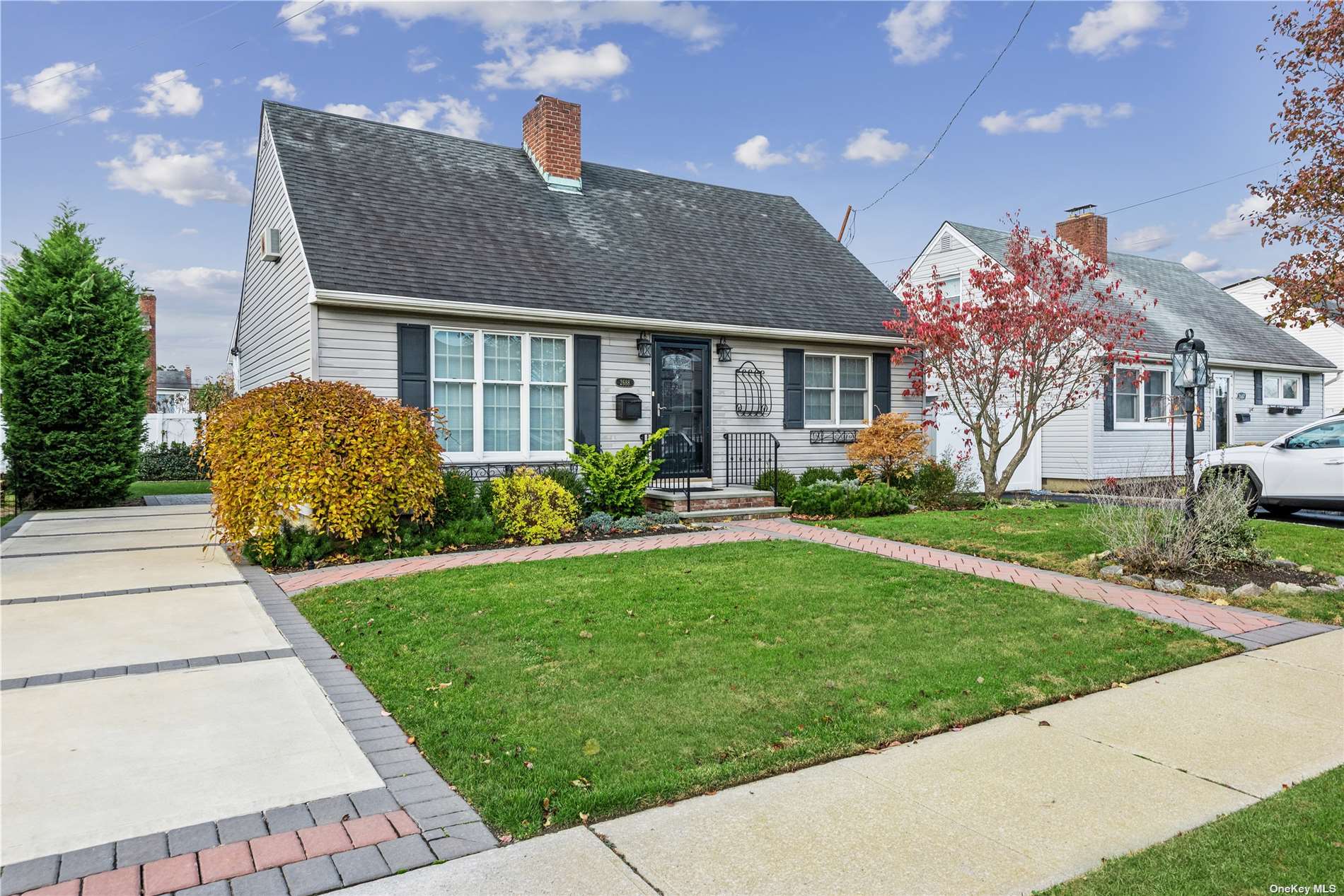 2688 Riverside Avenue Merrick, NY 11566 - Photo 1 of 1 a front view of a house with garden