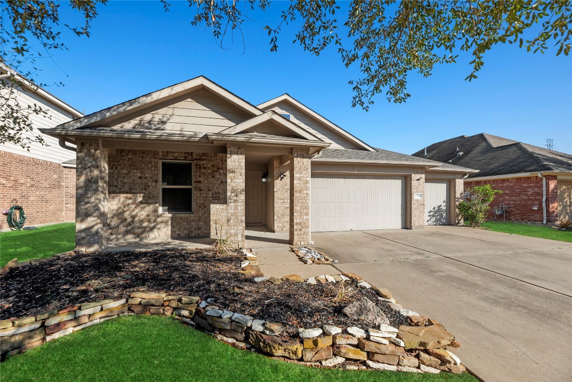 3311 Sabine Spring Lane Katy, TX 77449 - Photo 1 of 16 Welcome home to 3311 Sabine Spring Lane situated in the sought after Waterstone community! The property includes a rare three-car garage and sits on a well-maintained subdivision lot.